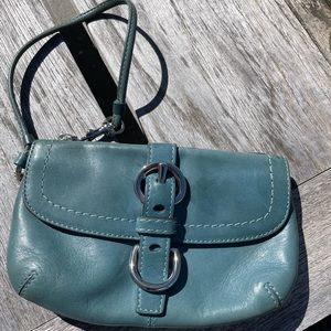 Coach teal wristlet.